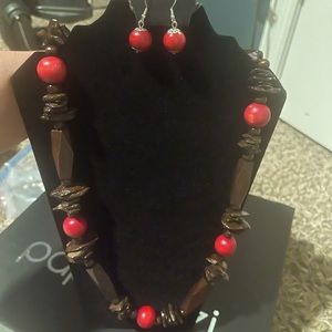 Necklace and earring set one size fits all.